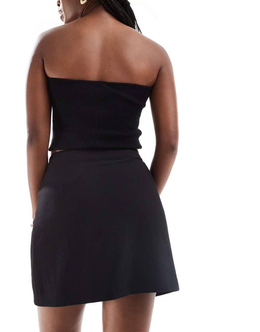 & Other Stories wrap mini skirt in black Product Image