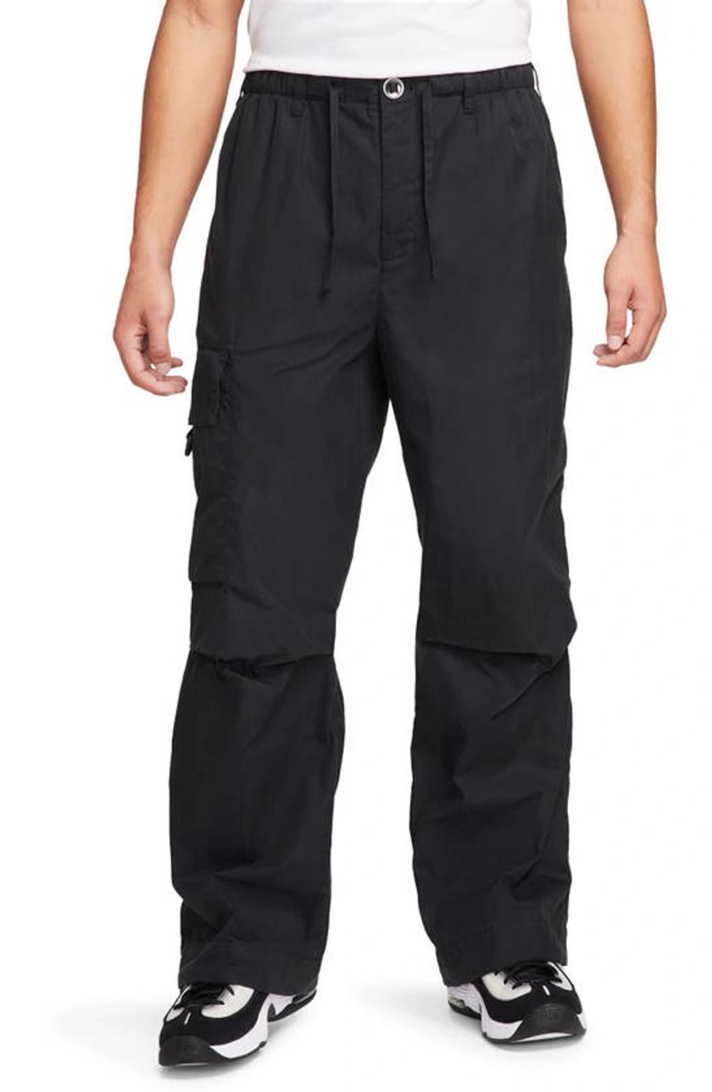 Men's  Sportswear Tech Pack Waxed Canvas Cargo Pants In Black Product Image