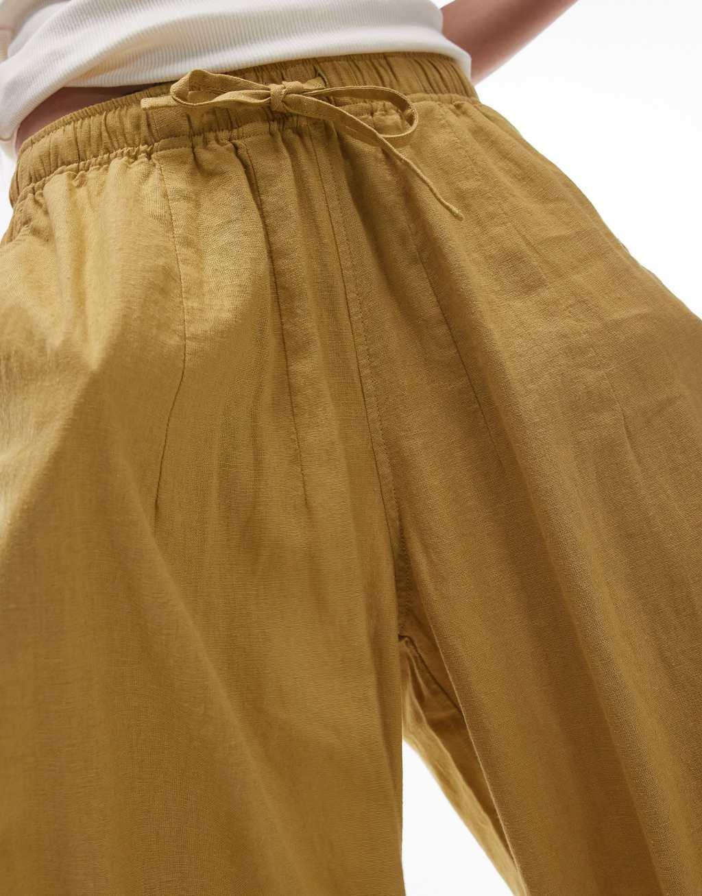 Topshop linen blend balloon pants in green Product Image