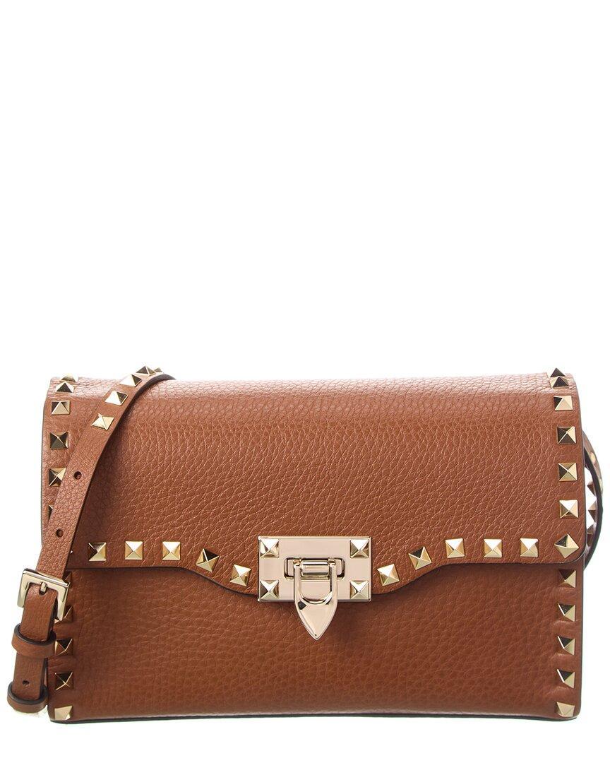 Valentino Rockstud Small Grainy Leather Crossbody In Brown Product Image