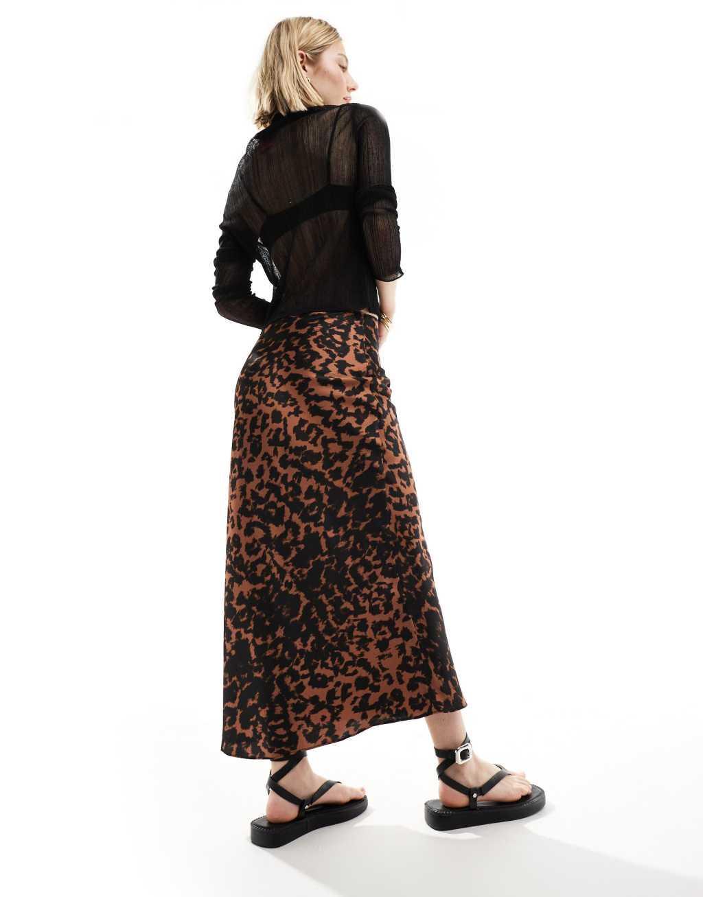 ASOS DESIGN satin bias midi skirt in animal print Product Image