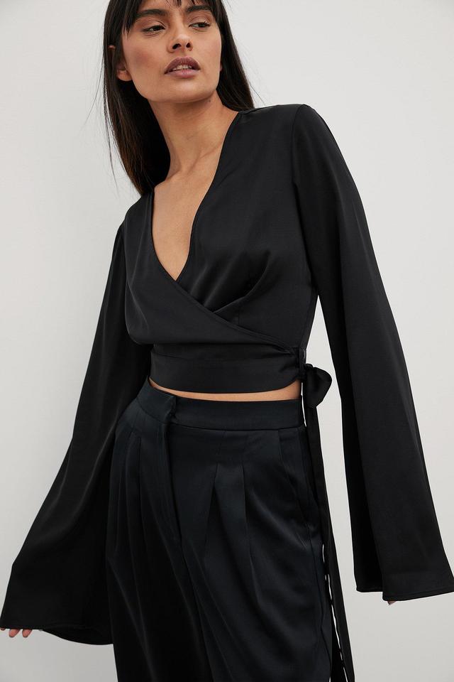 Trumpet Sleeve Wrap Front Satin Blouse Product Image