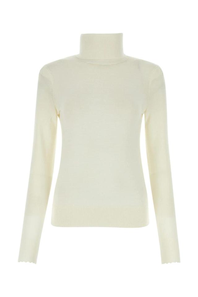 Wool Turtleneck Sweater In Cream Product Image