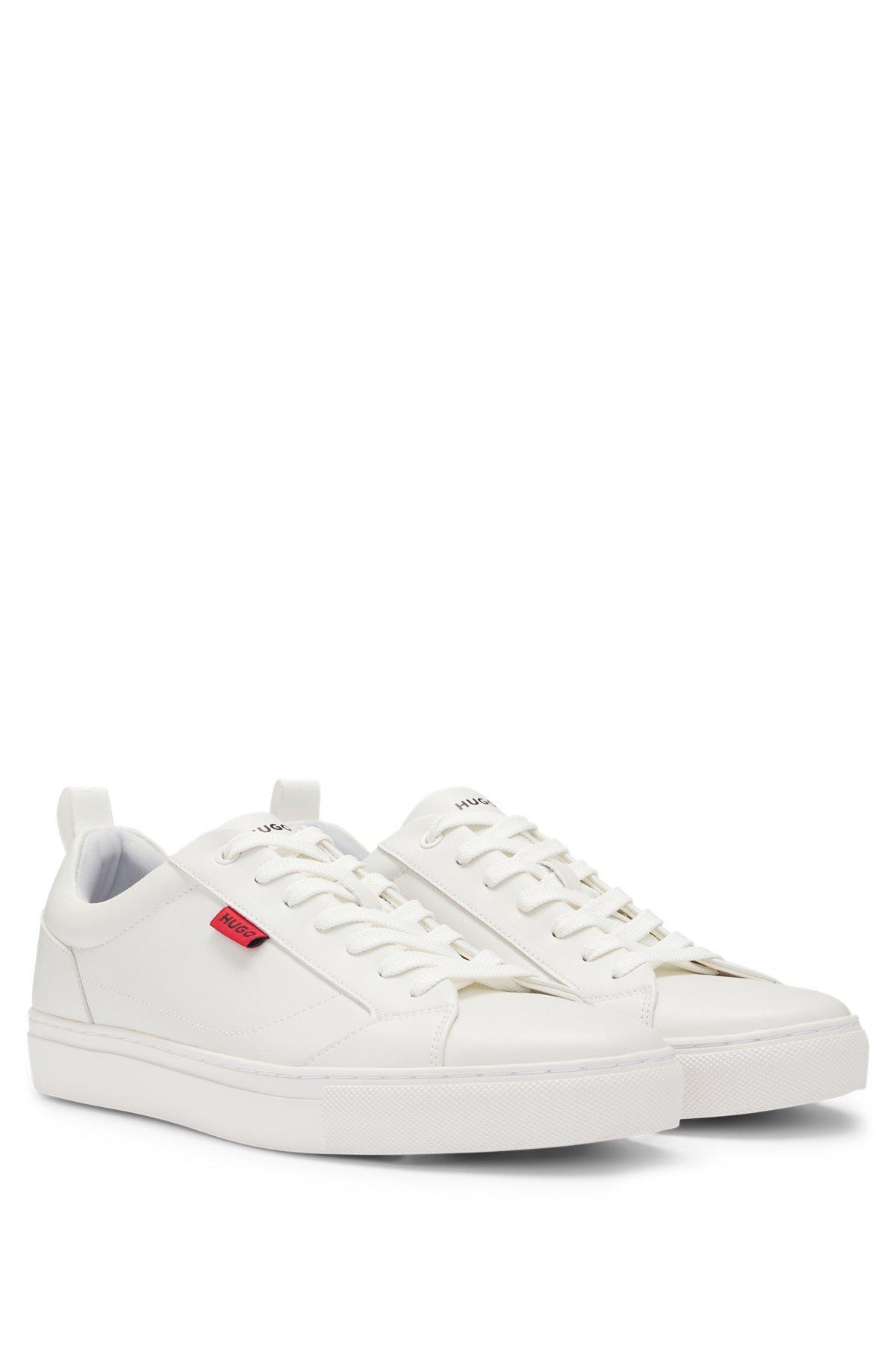 Faux-leather trainers with red logo flag Product Image