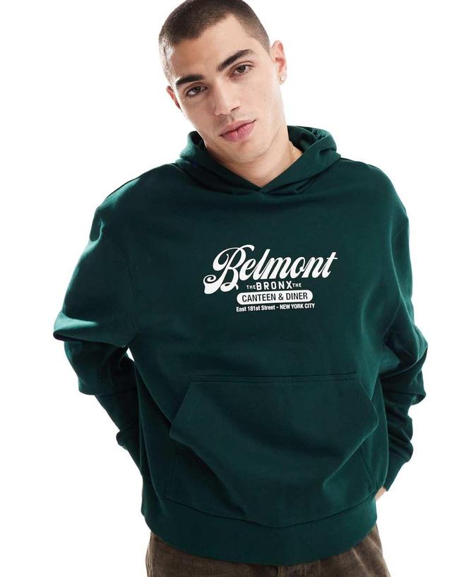 ASOS DESIGN oversized boxy hoodie with belmont print in green Product Image