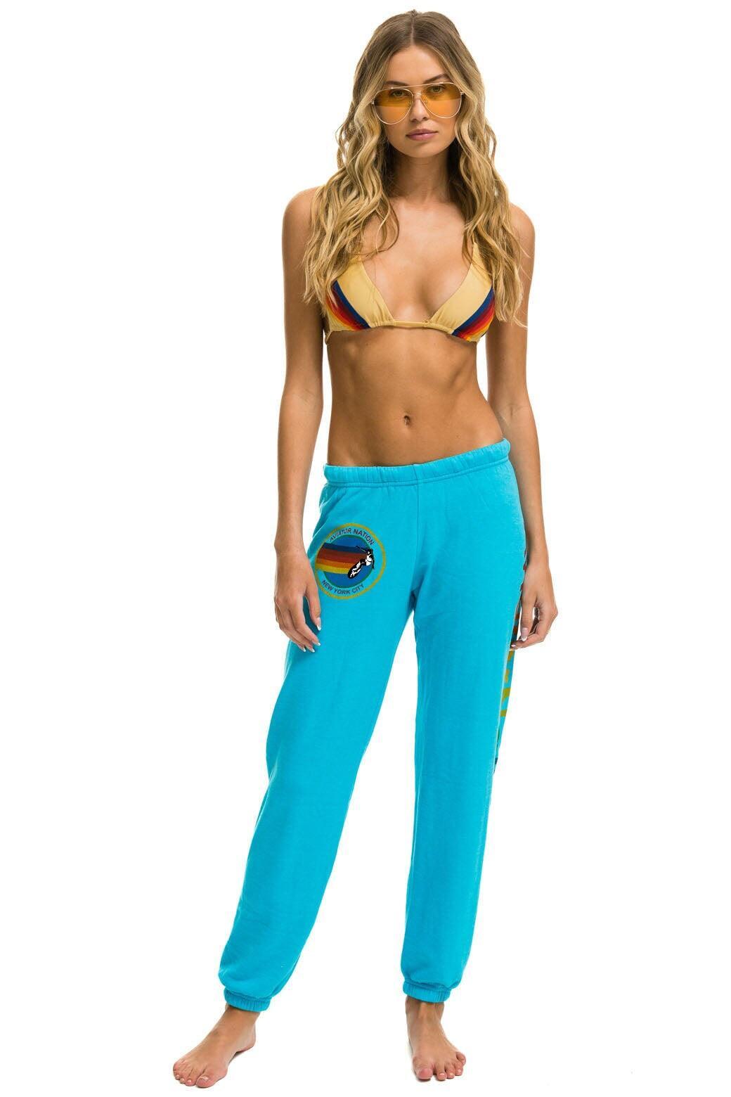 AVIATOR NATION SWEATPANTS - NEON BLUE Female Product Image