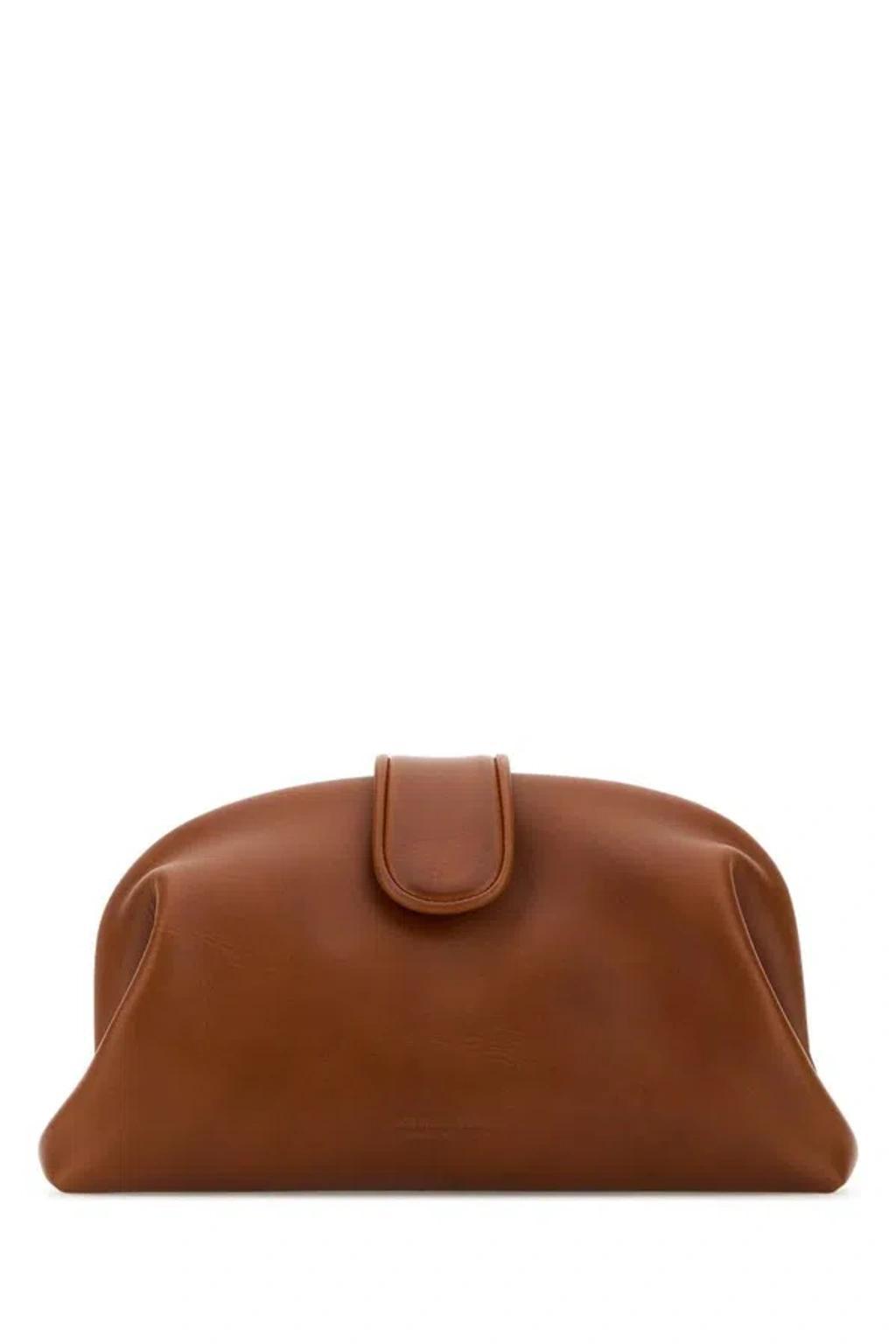 Handbags. In Brown product image