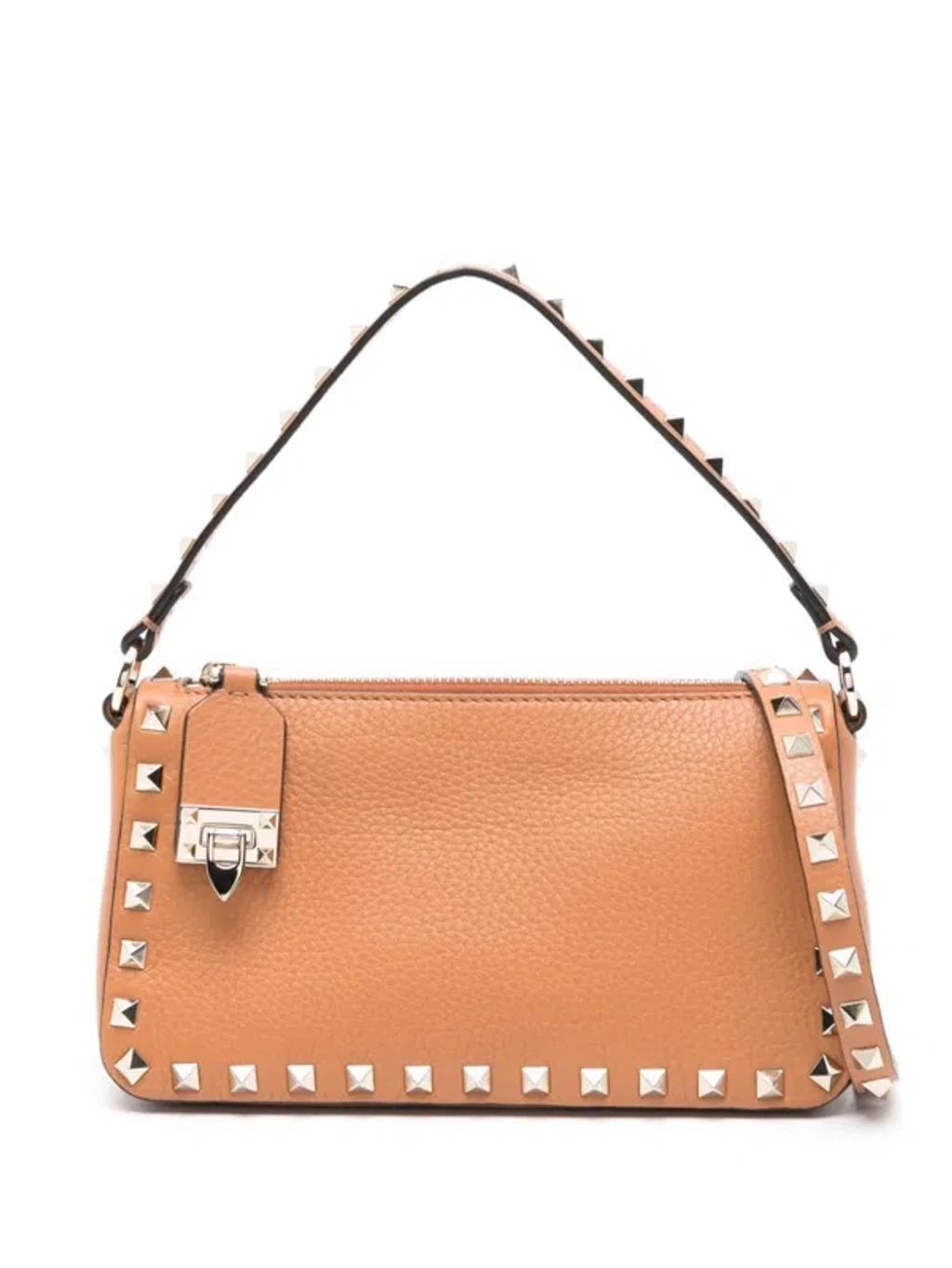 VALENTINO GARAVANI Rockstud-embellished Tote Bag In Beige Product Image