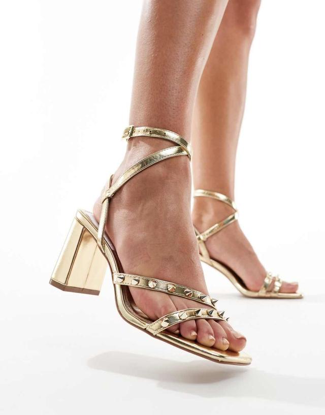 ASOS DESIGN Hampstead studded mid heel sandals in gold Product Image