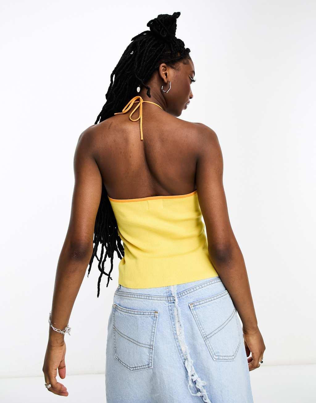 ASOS DESIGN knit halter top with cut-out detail and contrast trim in yellow Product Image