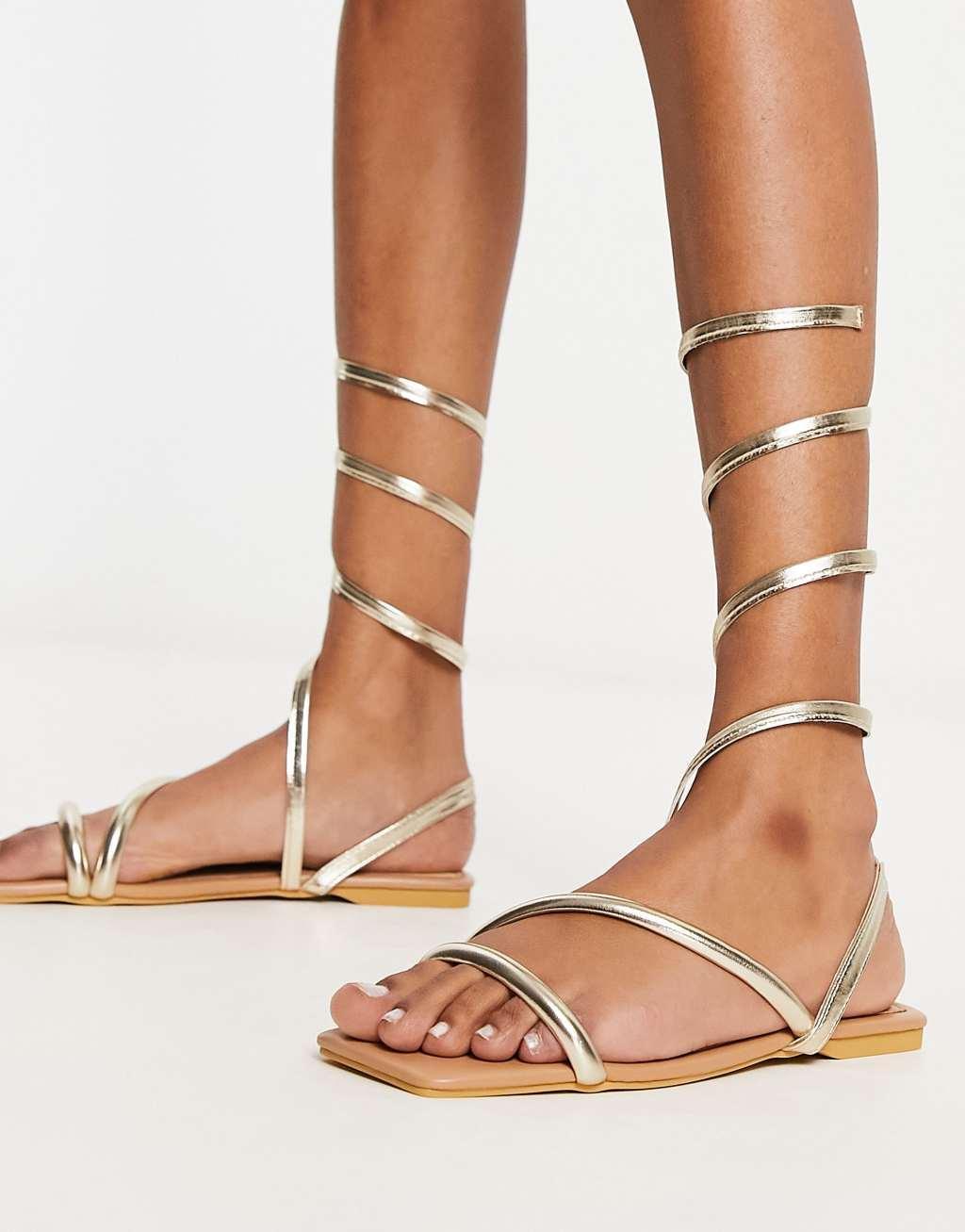 Truffle Collection wrap around minimal sandals in gold metallic Product Image