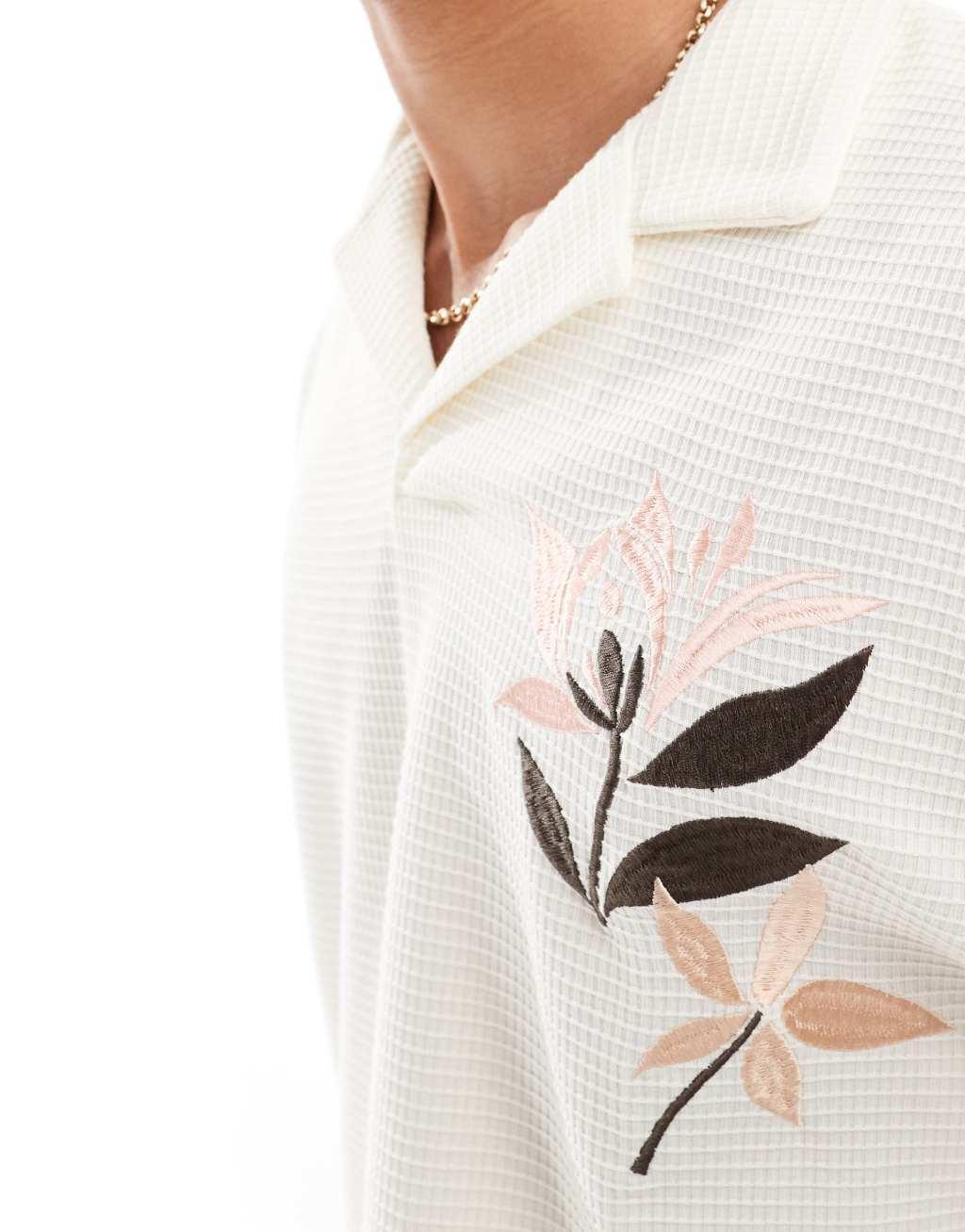 ASOS DESIGN oversized button through texture polo with embroidery Product Image