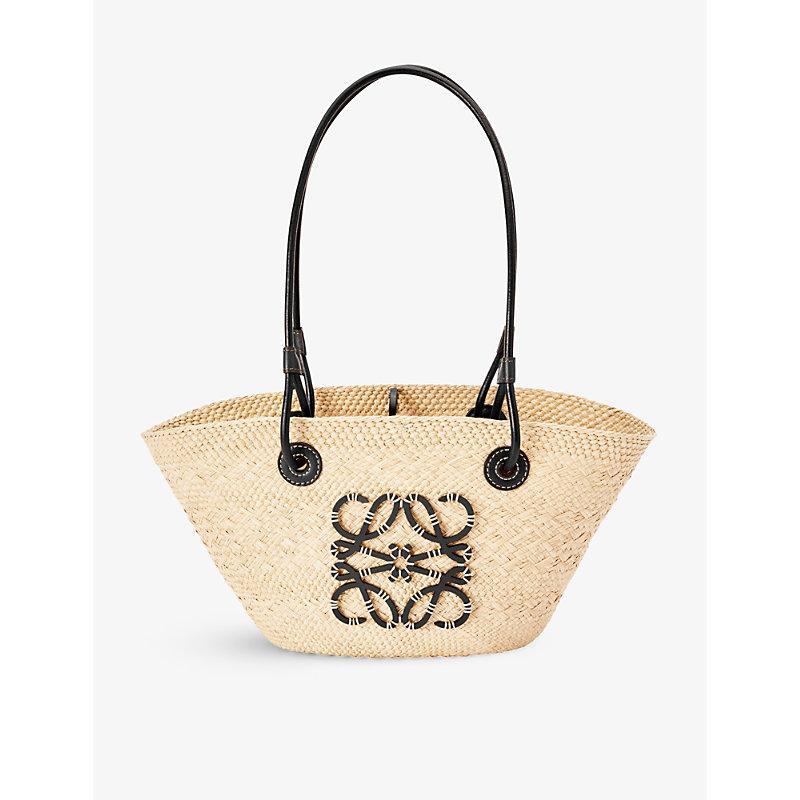 LOEWE X Paula's Ibiza Anagram Small Basket Bag In Iraca Palm With Leather Handles In Natural Black Product Image