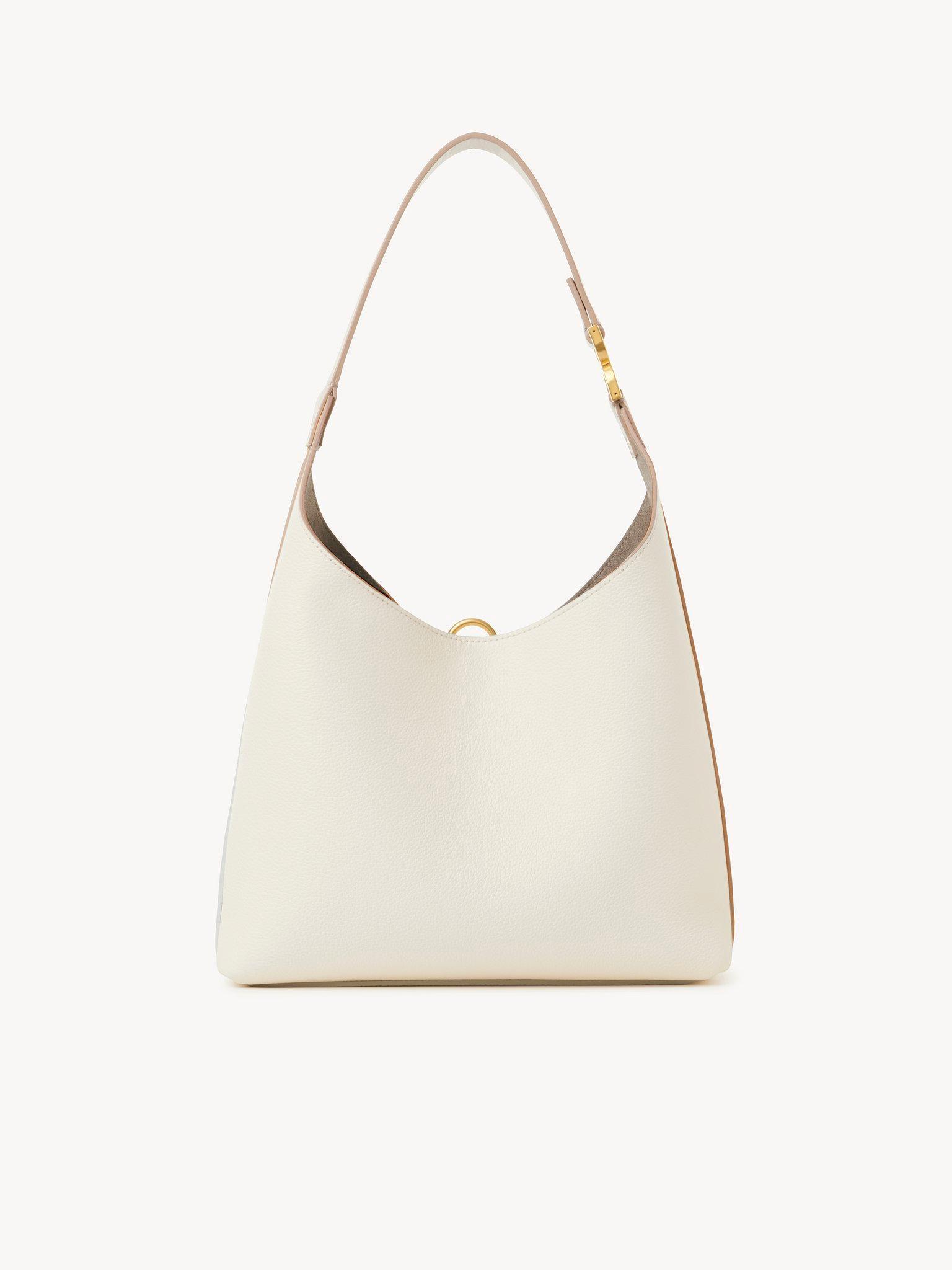 Small Marcie hobo bag in grained leather Product Image