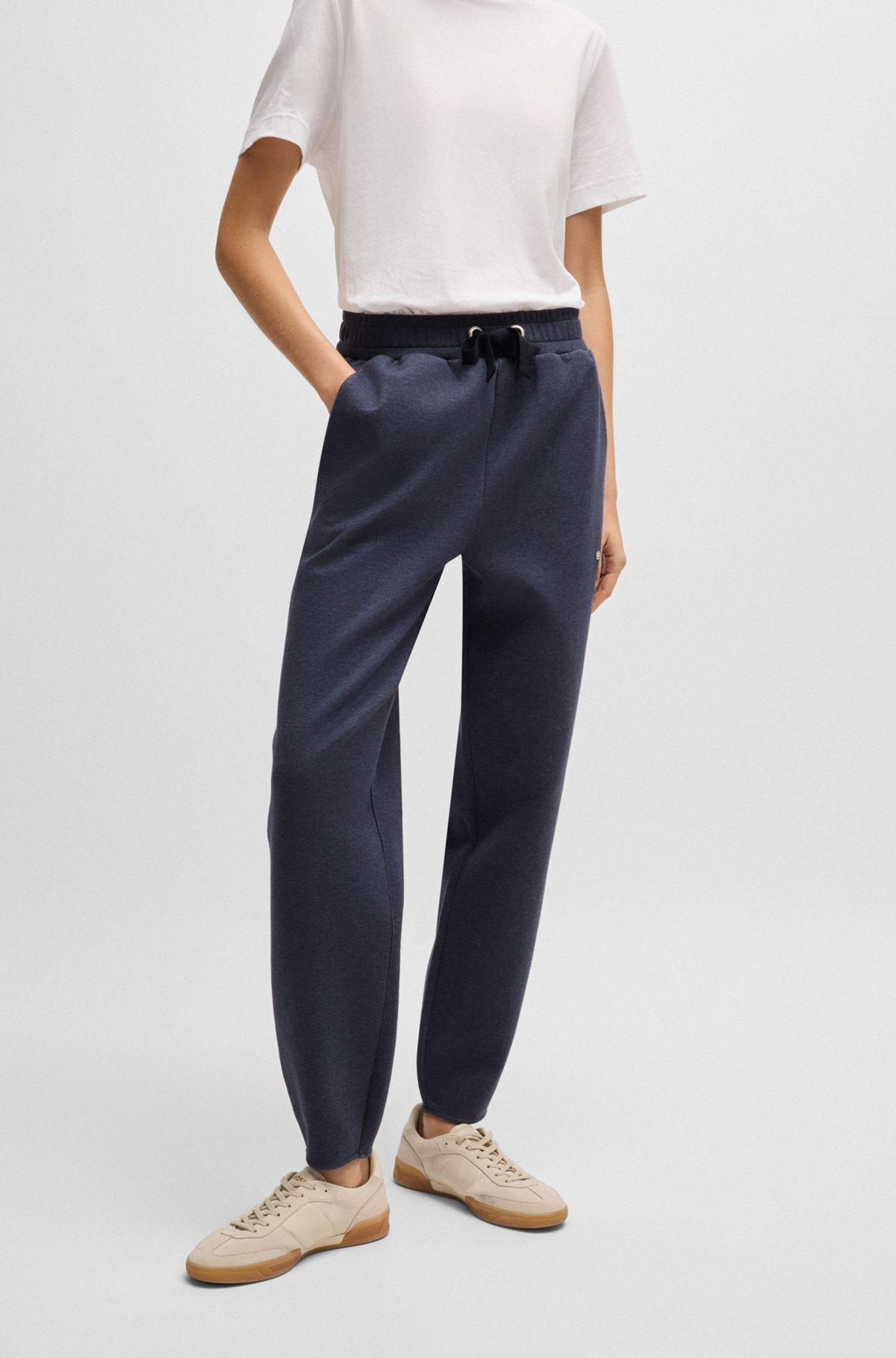 Cuffed tracksuit bottoms in melange cotton Product Image