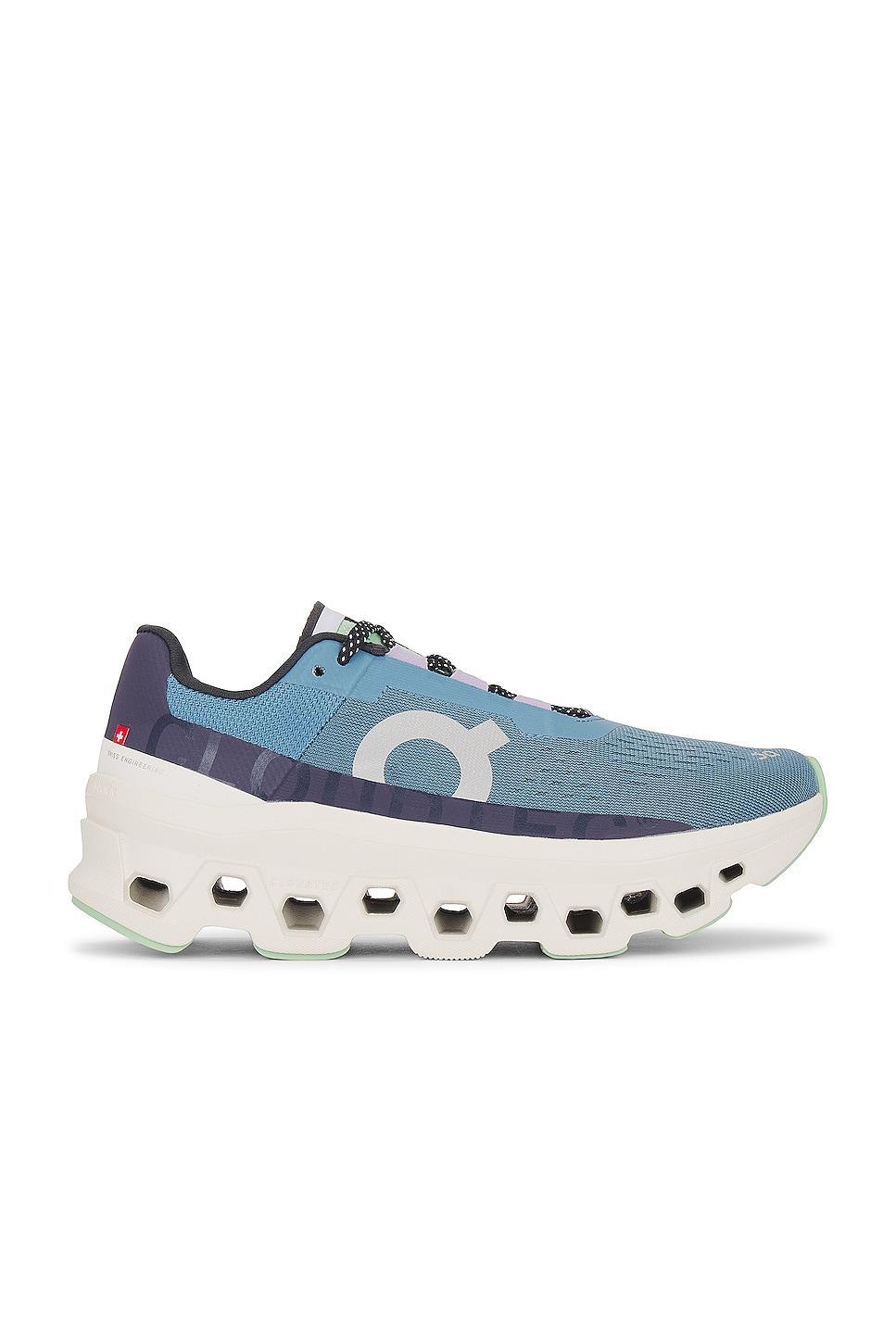 On Cloudmonster Sneaker in Dust & Vapor - Blue. Size 6.5 (also in 5, 9.5). Product Image