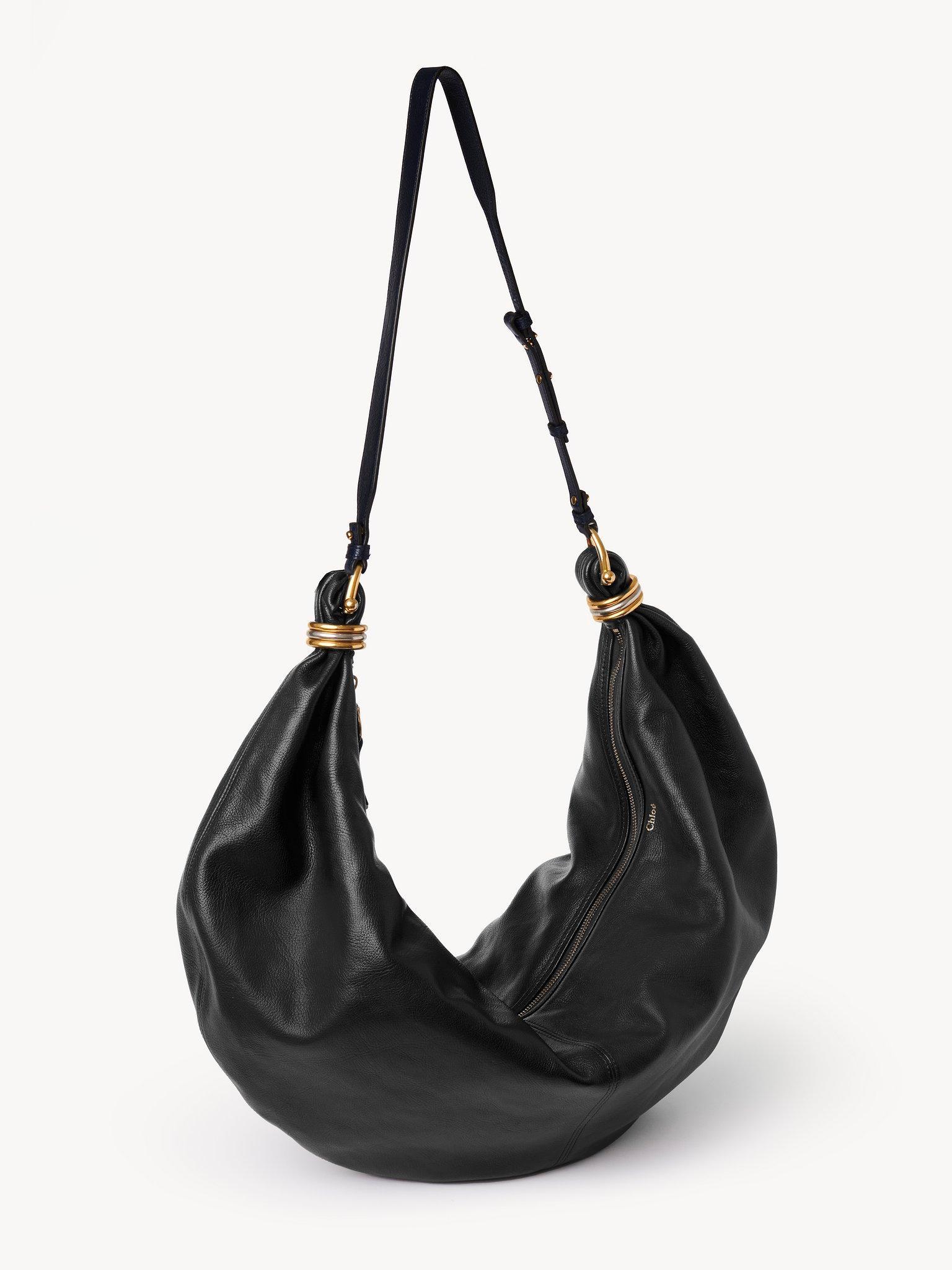 Large Bracelet Hobo bag in grained leather Product Image