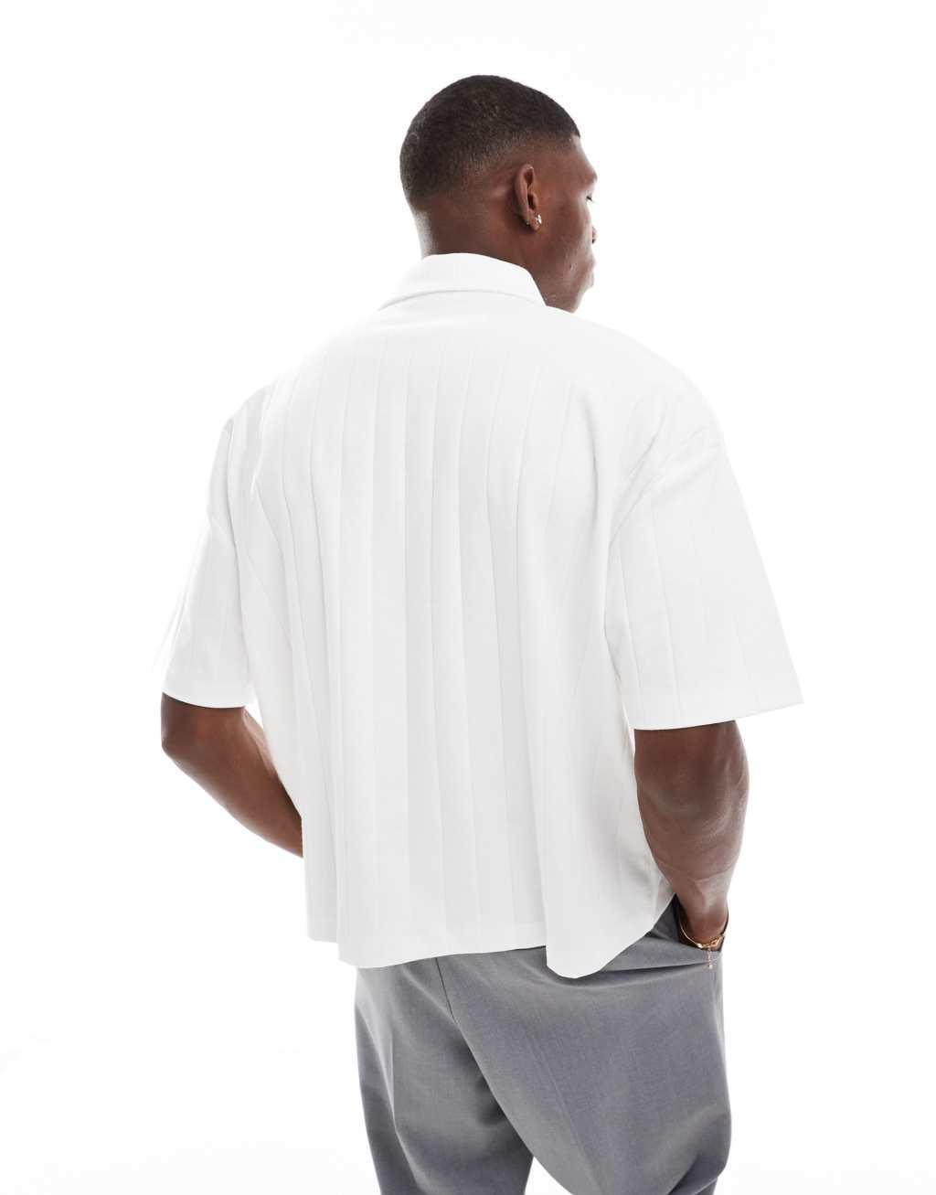 ASOS DESIGN oversized boxy polo with wide rib in white Product Image