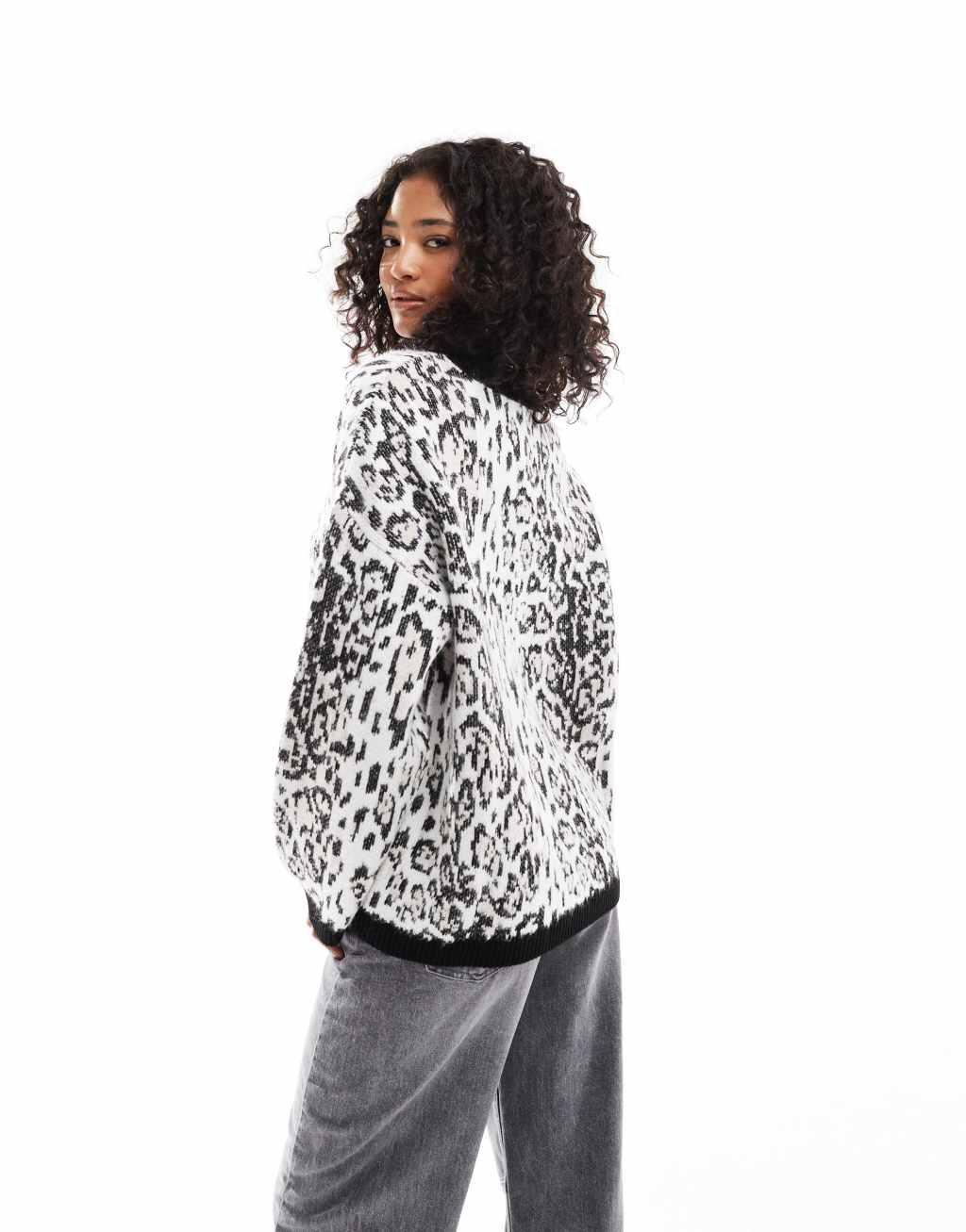 ASOS DESIGN knitted fluffy sweater in leopard print Product Image