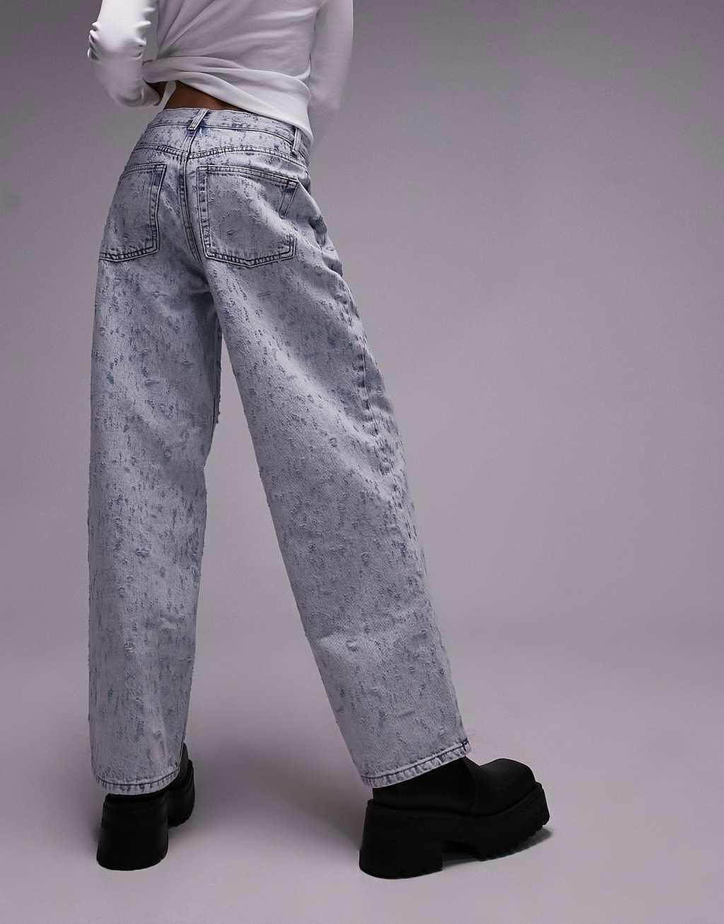 Topshop extreme ripped low-slung boyfriend jeans in bleach Product Image