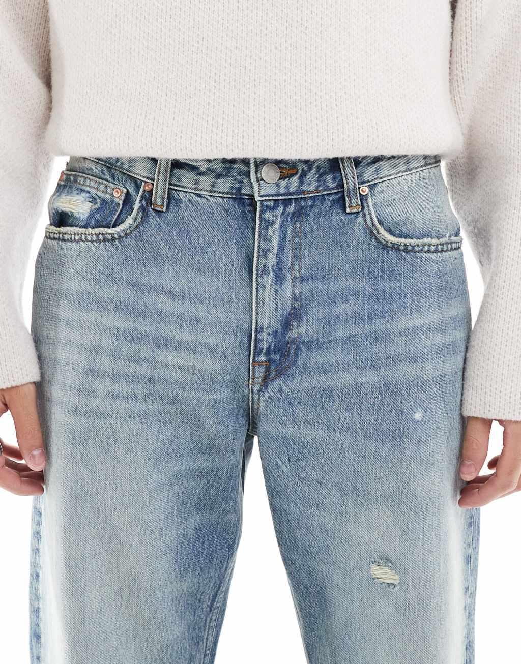 ASOS DESIGN wide flare jeans in light wash blue Product Image