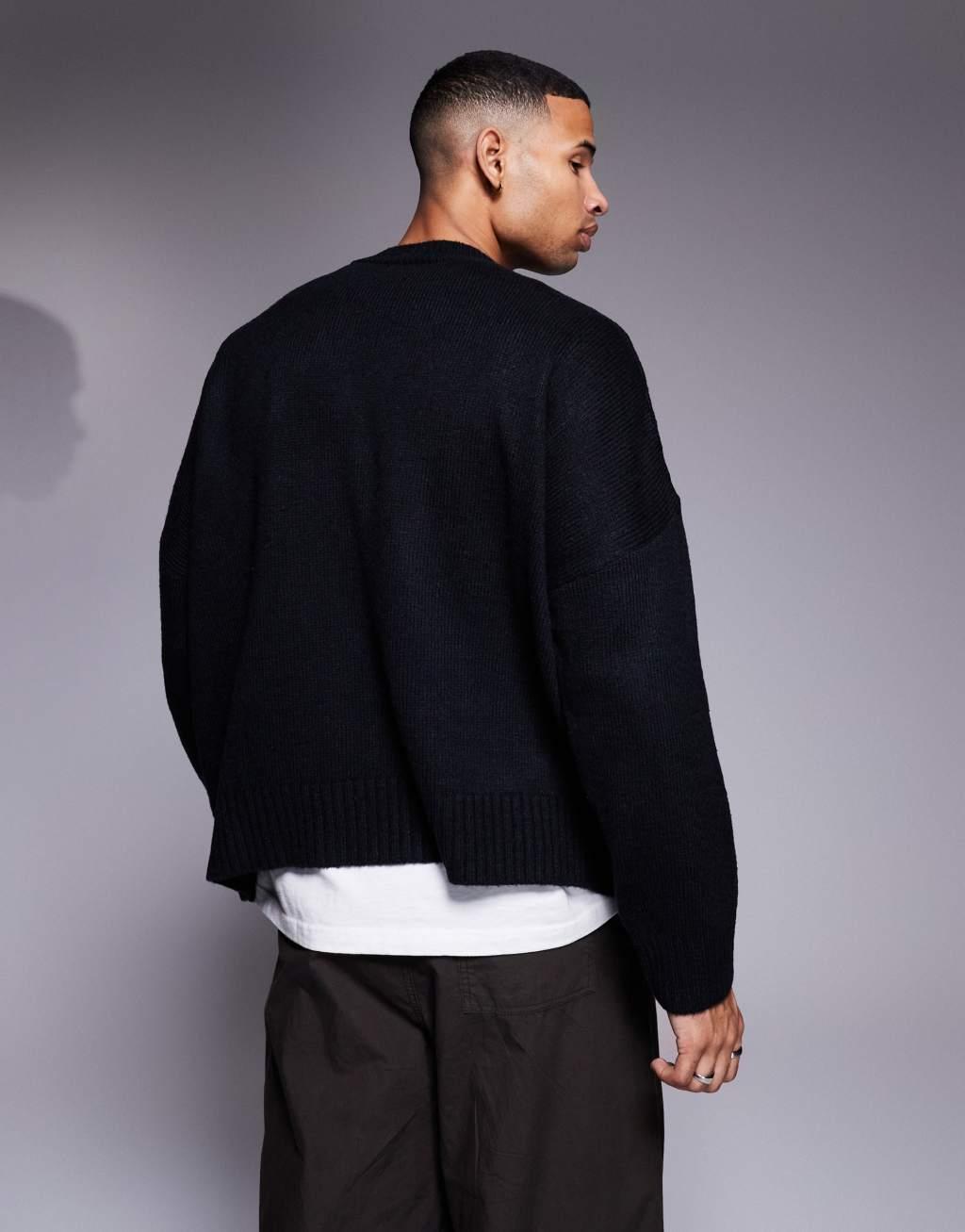 ASOS DESIGN super oversized boxy fit knitted crew neck sweater with city text pattern in navy Product Image