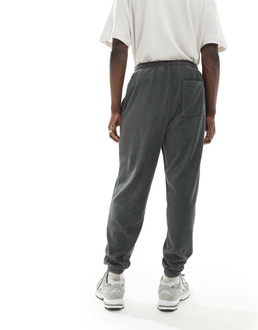 ASOS DESIGN oversized ribbed velour sweatpants in washed charcoal Product Image