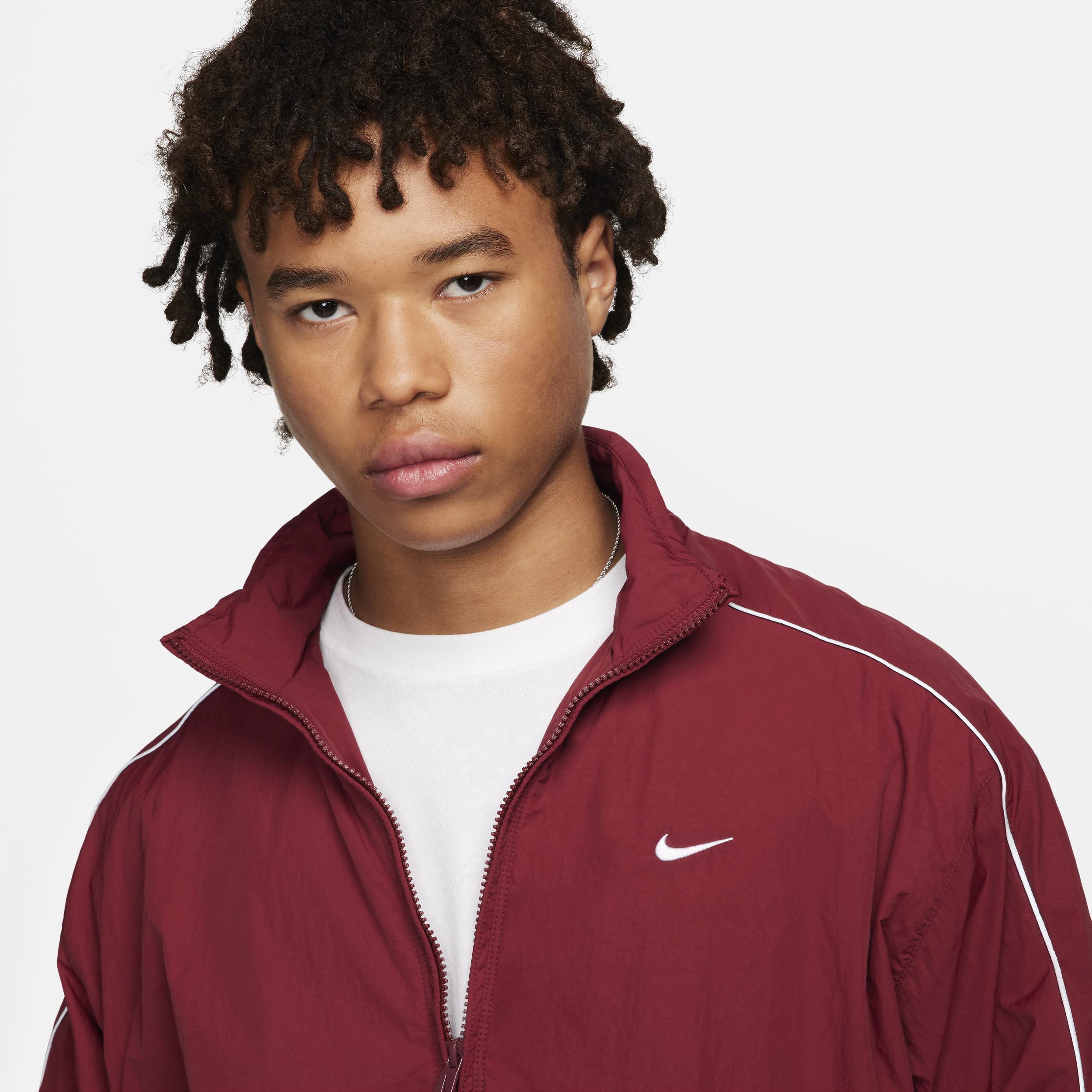 Men's Sportswear Solo Swoosh Woven Track Jacket In Team Red/white Product Image