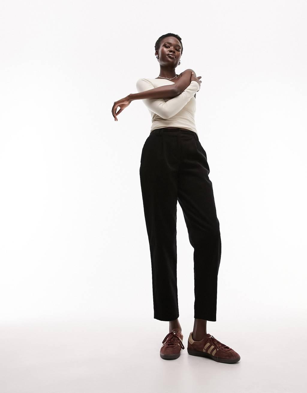 Topshop Tall cord peg pants in black Product Image