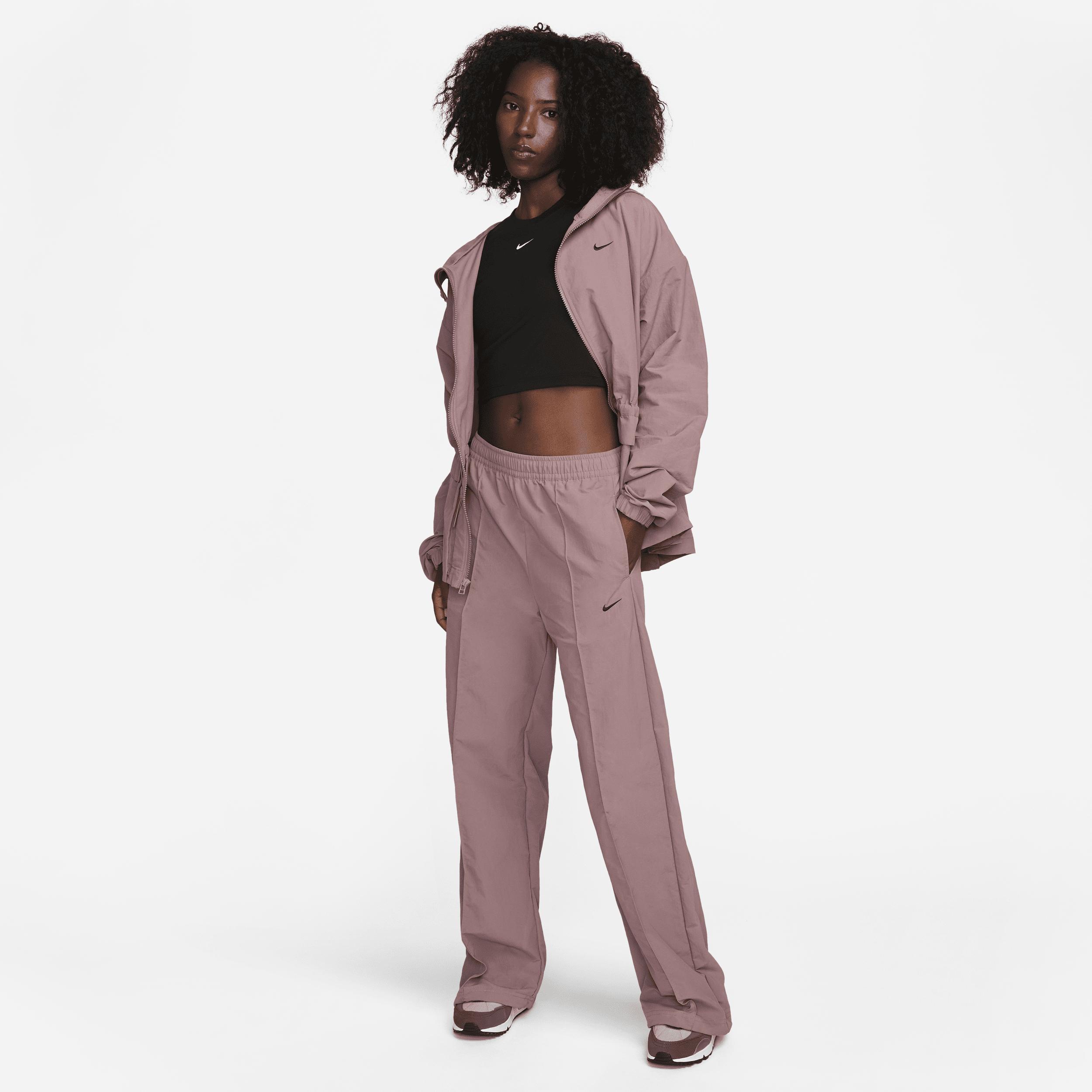 Nike Trend woven baggy parachute pants in smokey mauve Product Image