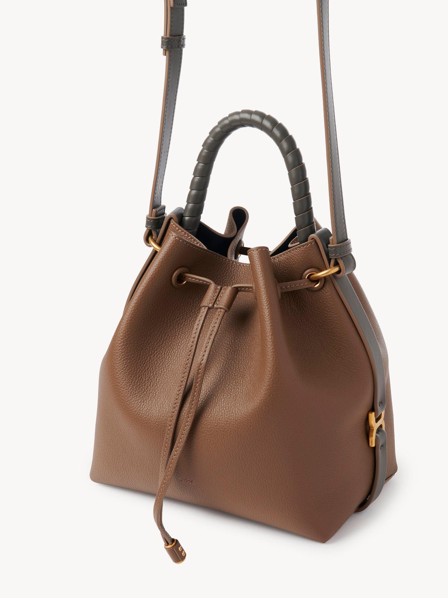 Marcie bucket bag in soft leather & braided fibers Product Image