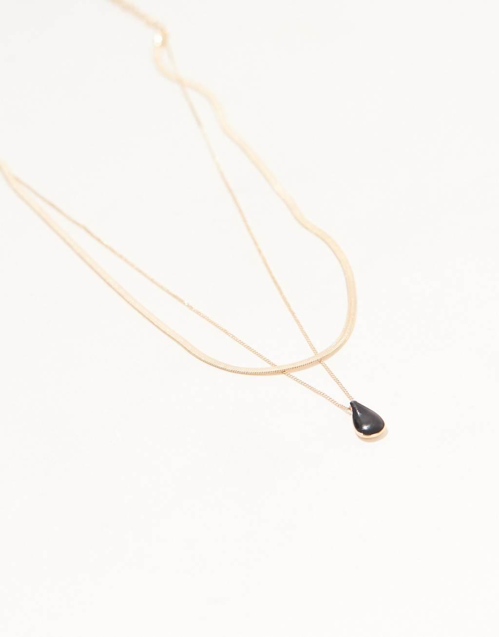 ASOS DESIGN necklace with molten pebble pendant in gold tone Product Image