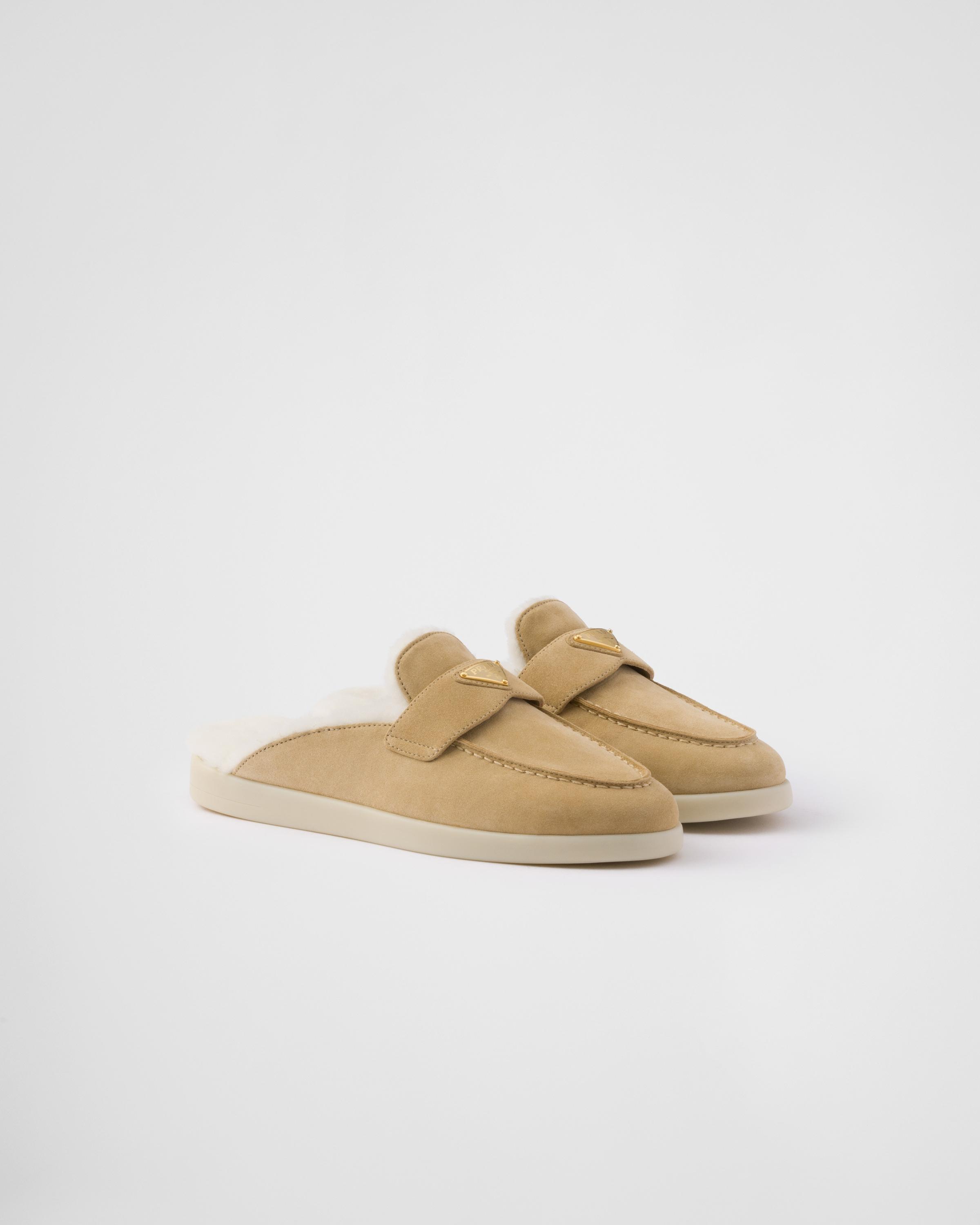 Suede and shearling mules Product Image