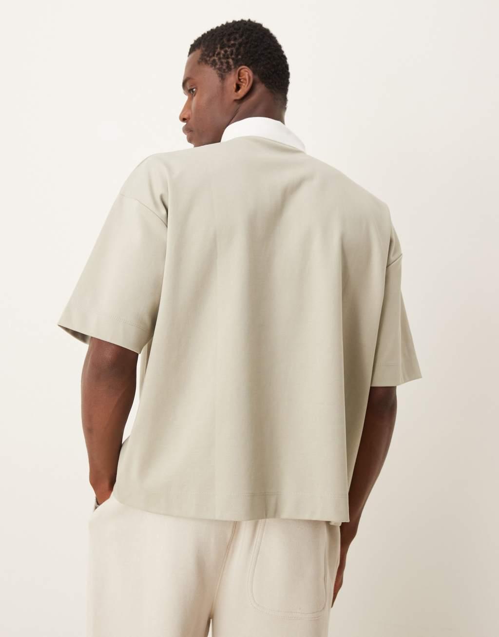 ASOS DESIGN oversized boxy polo in heavyweight 300gsm stone with chest print Product Image