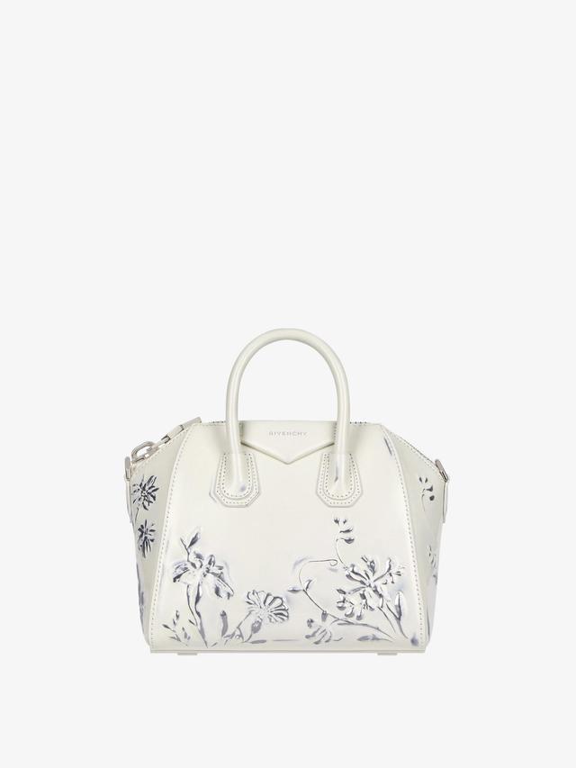 Mini Antigona bag in leather with floral pattern Product Image