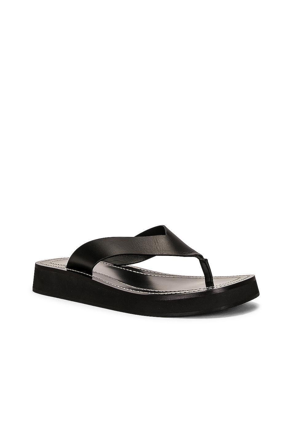 The Row Ginza Sandal in Black - Black. Size 39 (also in 35, 35.5, 36, 36.5, 37, 37.5, 38, 38.5, 39.5). Product Image