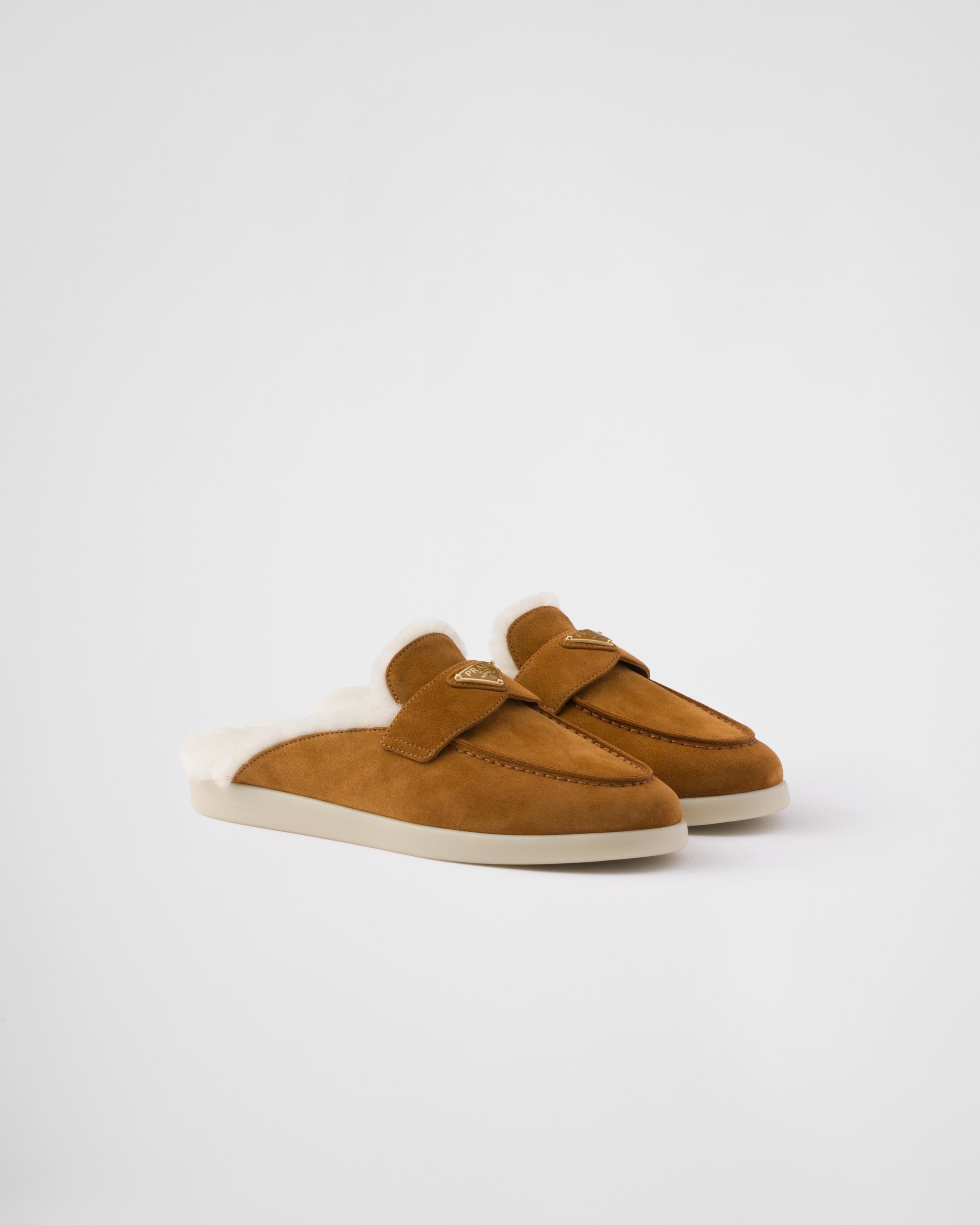 Suede and shearling mules Product Image