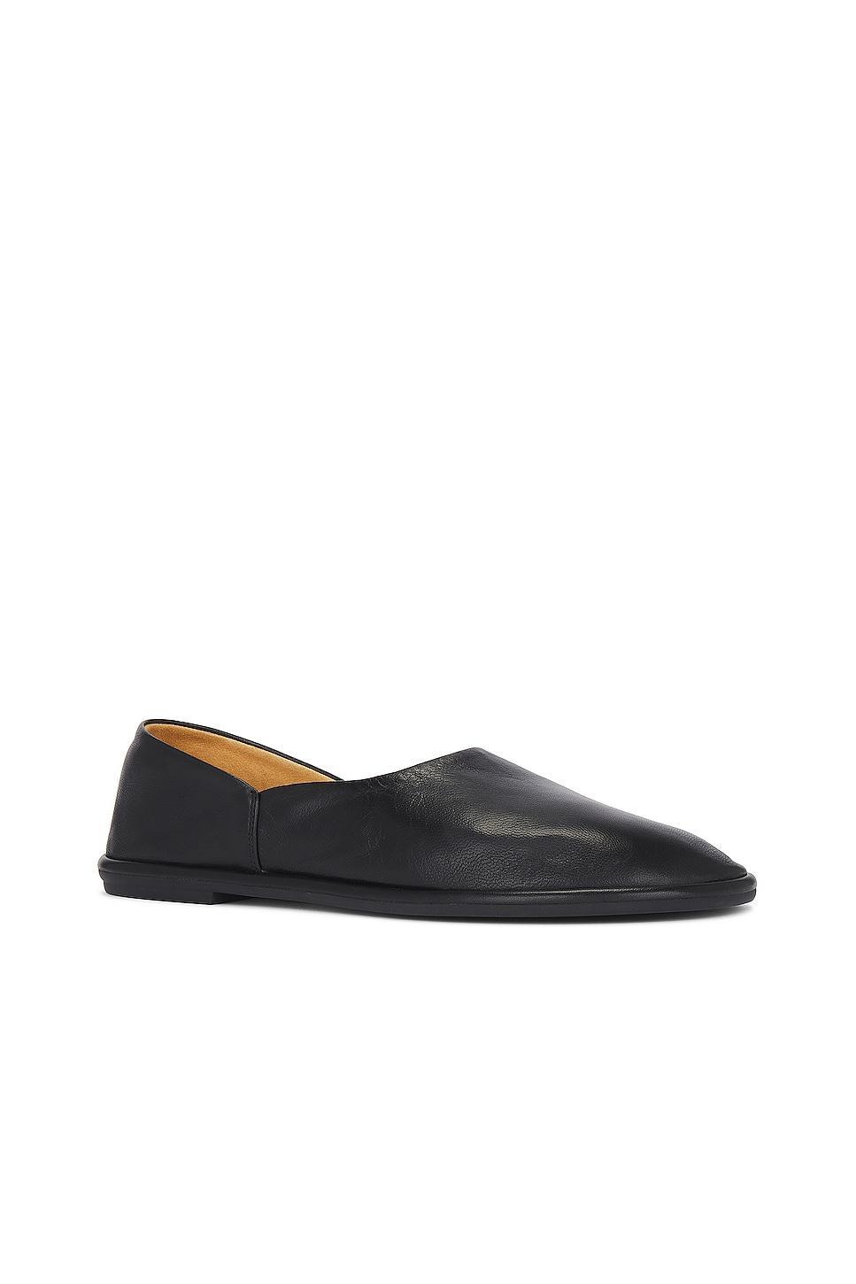 The Row Canal Slip On Slippers in Black - Black. Size 39.5 (also in 41). Product Image