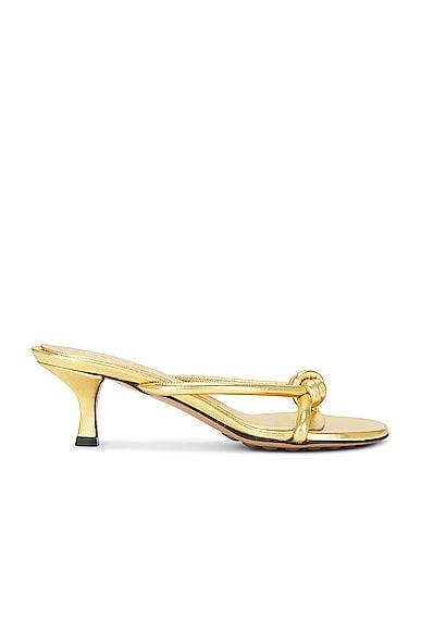 Bottega Veneta Metallic Blink Mule Sandal in Gold - Metallic Gold. Size 41 (also in 36, 36.5, 38, 38.5, 39.5, 40). Product Image