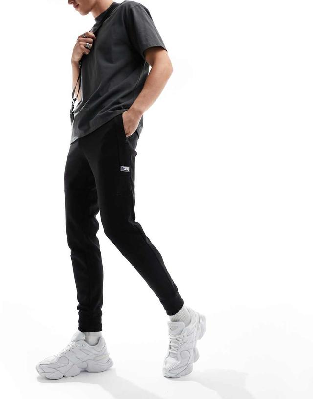 Jack & Jones tech sweatpants in black  Product Image