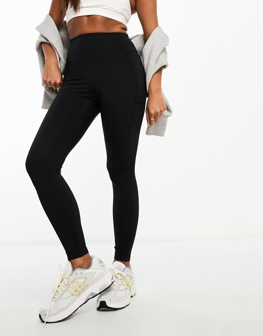 ASOS 4505 CurveIcon running tie waist gym leggings with phone pocket in navy Product Image