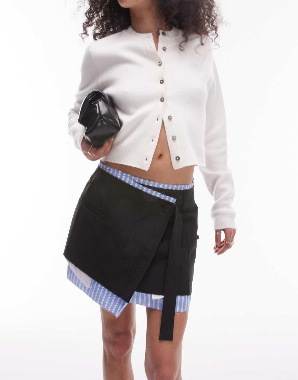 Topshop wrap over raw contrast mini skirt in black Product Image