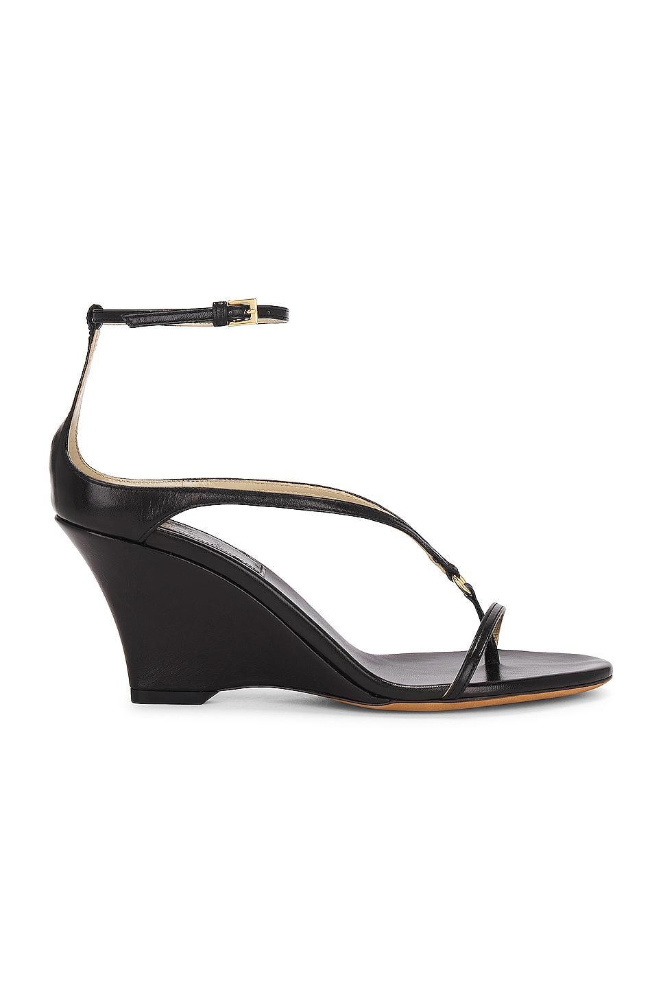 KHAITE Marion Ankle Strap Wedge Sandal in Black Product Image