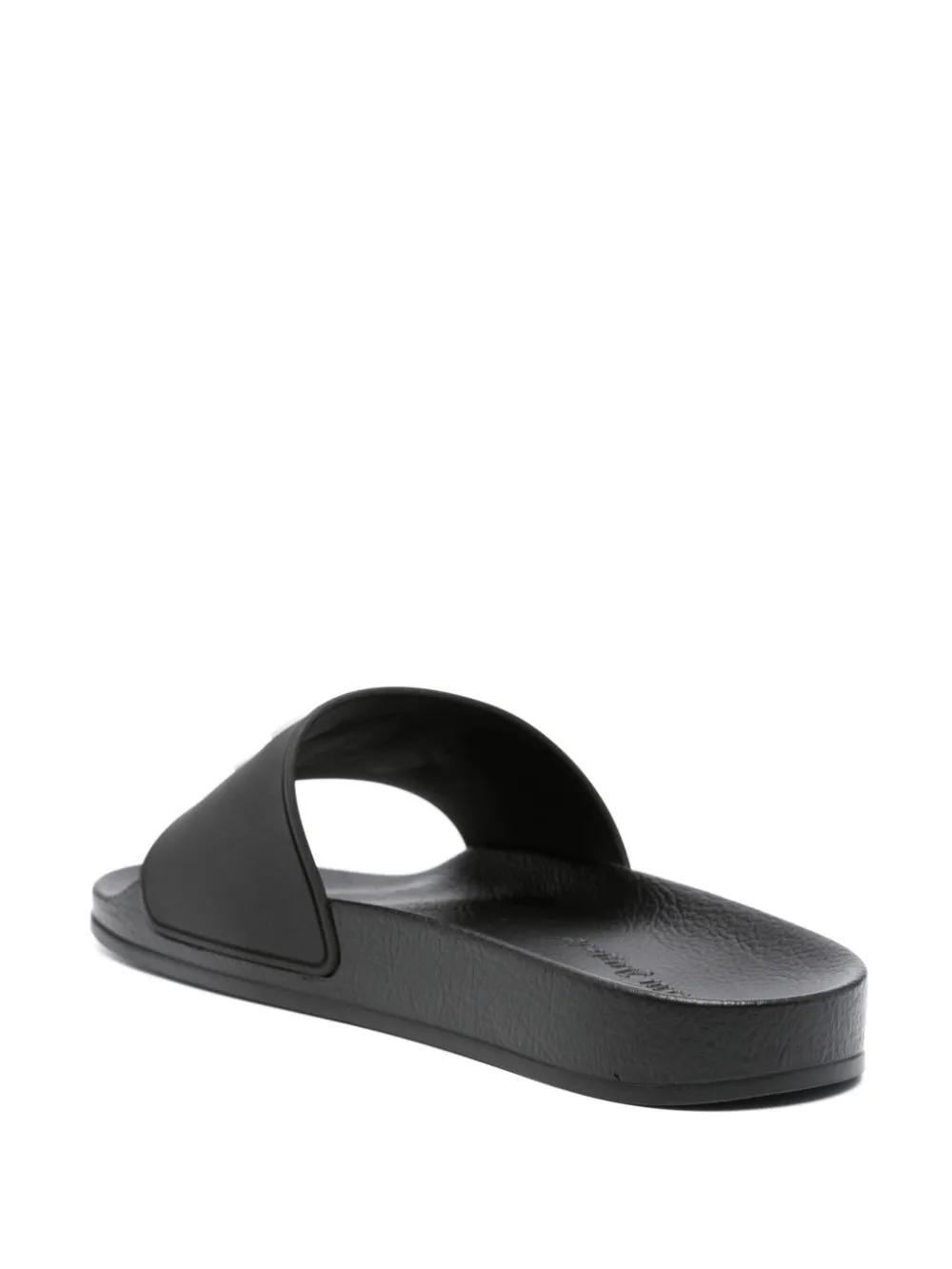 raised-monogram slides Product Image