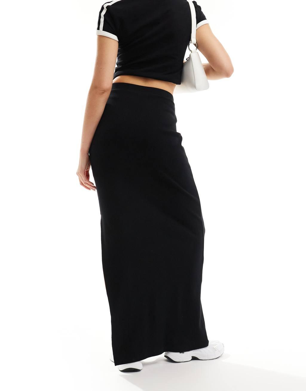 ASOS DESIGN Curve ribbed maxi skirt with side slit in black Product Image