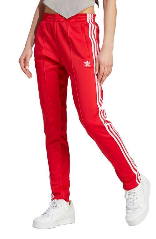 adidas Adicolor SST Track Pants Better Scarlet XL Womens Product Image