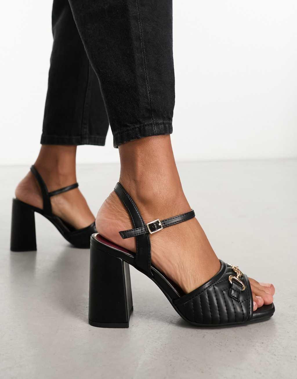 River Island block heel with hold buckle detail in black Product Image