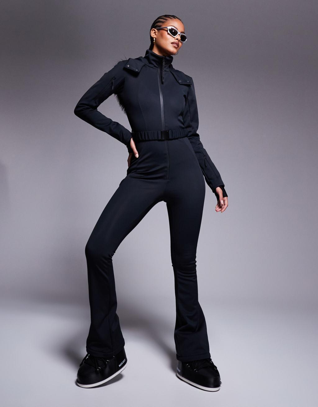 ASOS 4505 Tall Ski belted ski suit with slim kick leg and faux fur hood in black Product Image