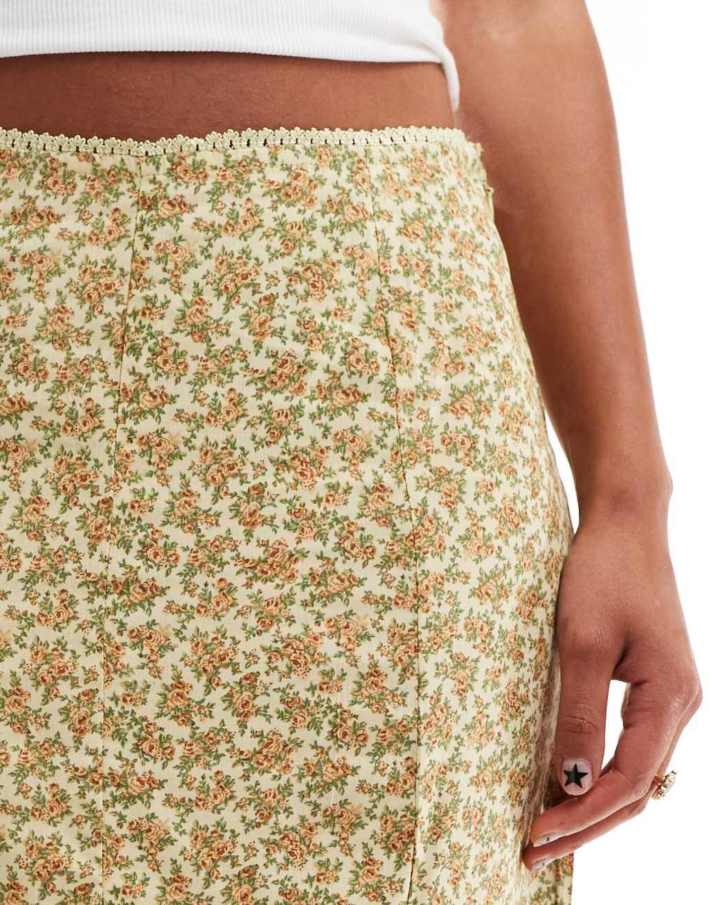 Motel Exclusive sima vintage floral knee length midi skirt in washed yellow Product Image