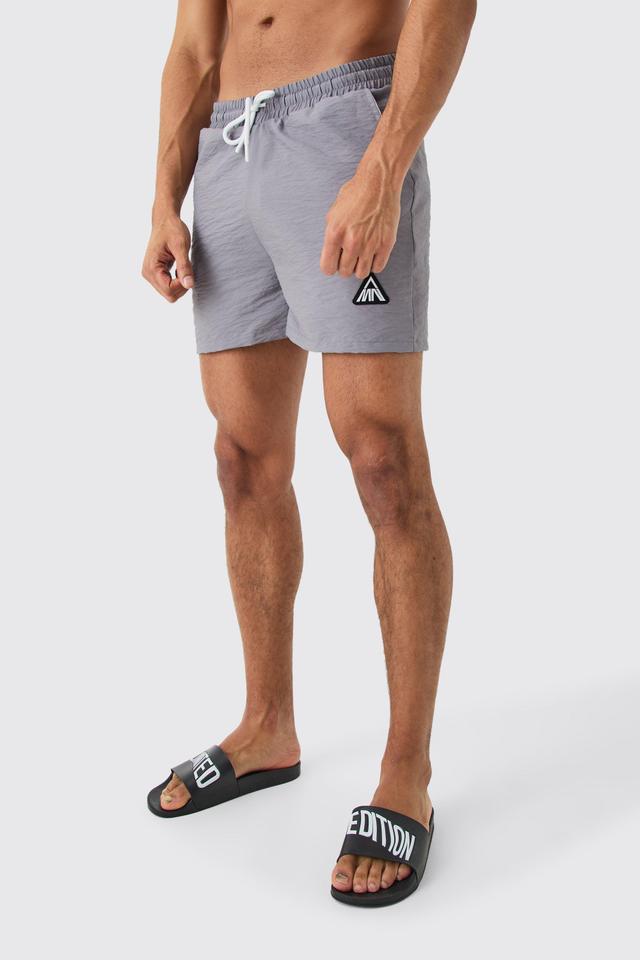 Short Length Man Triangle Crinkle Swim Short | boohooMAN USA Product Image